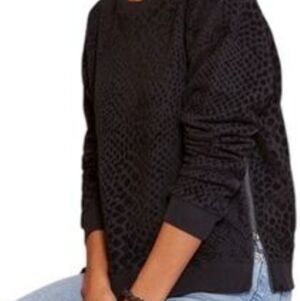Rails Marlo black flocked cobra print sweatshirt with side zippers. 